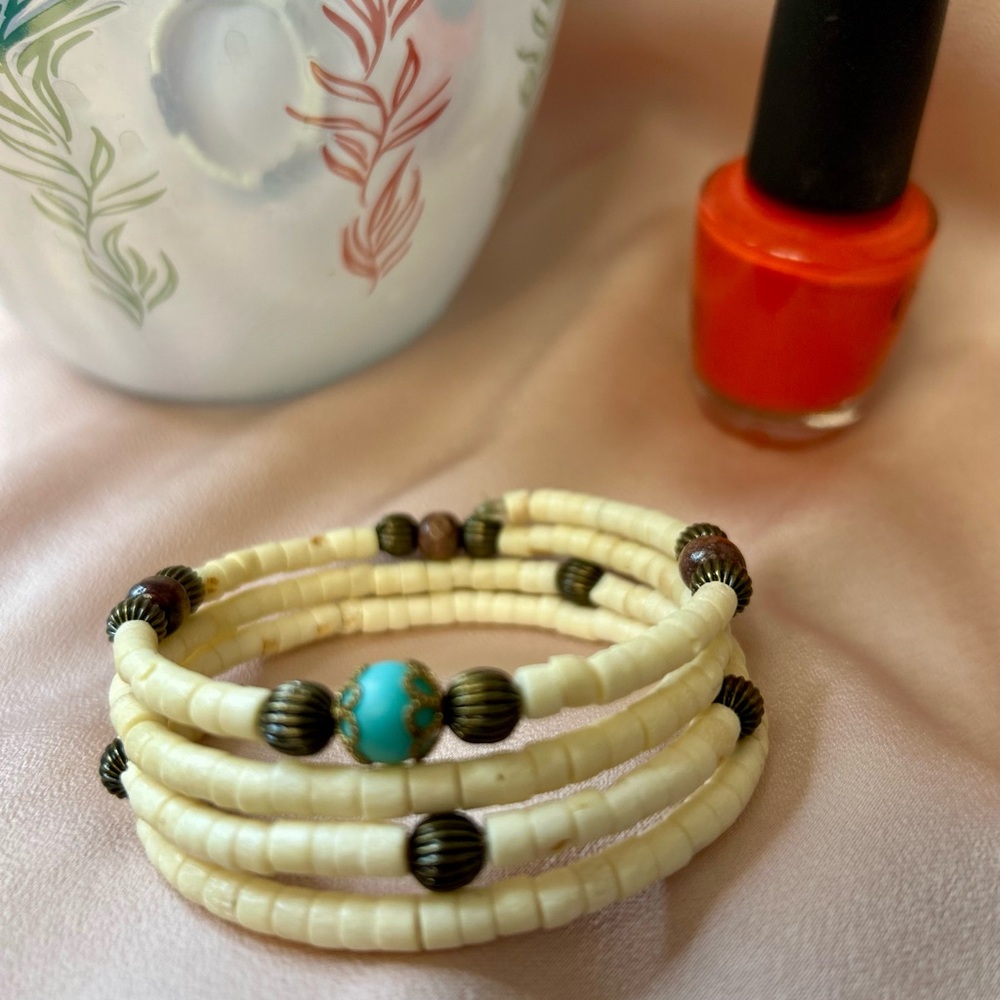 Ivory Coil Bracelet with Turquoise Accent and Antiqued Beads
